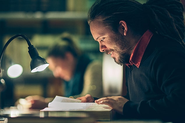 Group of Students Studying in a Library