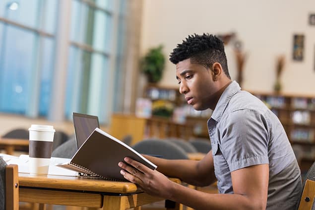 Student studying in library