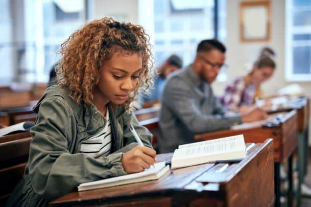 Female student does schoolwork